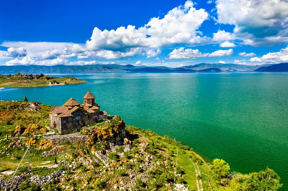 Show a panoramic photo of Lake Sevan in Armenia.  